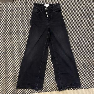 HM high-rise wide leg black jeans with chewed hem.
